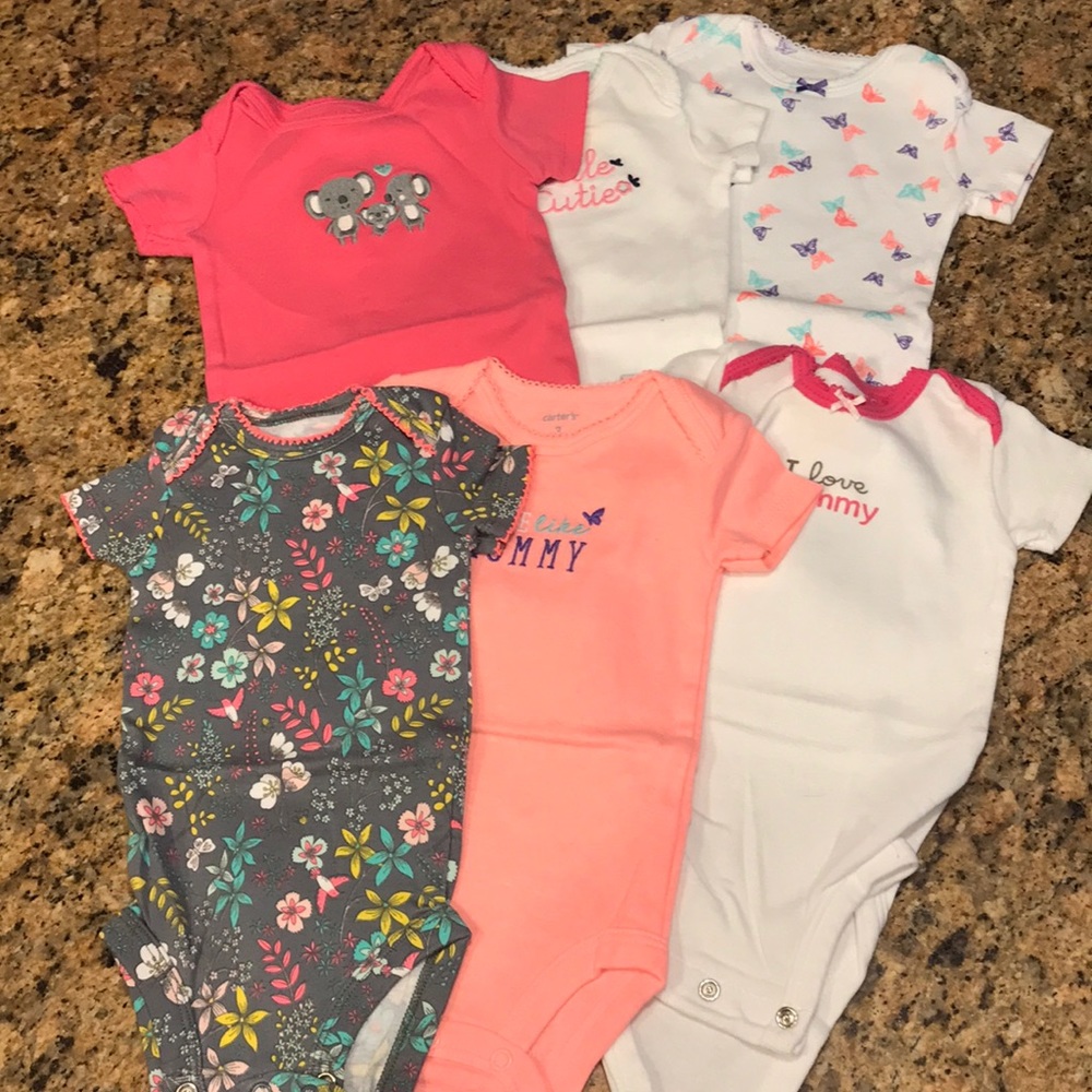 Set of 7 infant size 3 month one piece onesies.